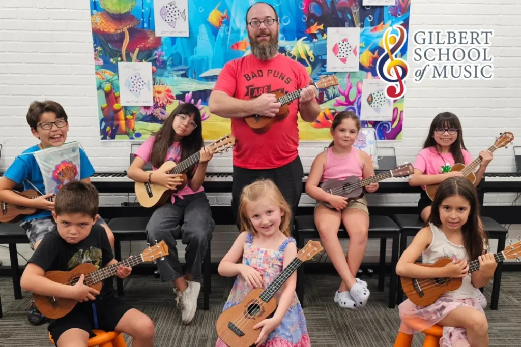Group of kids learning ukulele together at Gilbert School of Music